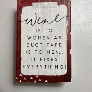 Wine is to women as duct tape block sign SS