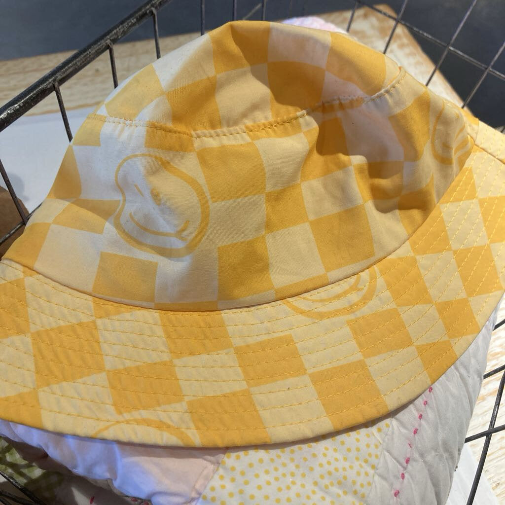 Checkered yellow smiley bucket hat